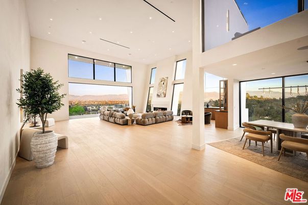 Dining room, Fireplace, Interior, Living room, Recessed Lighting, Wood Texture Flooring