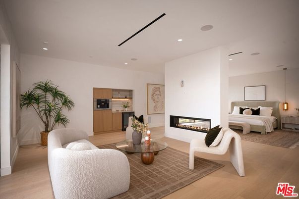 Bedroom, Fireplace, Interior, Living room, Pendant Lights, Recessed Lighting, Wood Texture Flooring