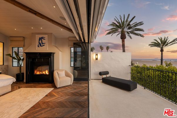Exterior, Fireplace, Recessed Lighting, Water, Wood Texture Flooring