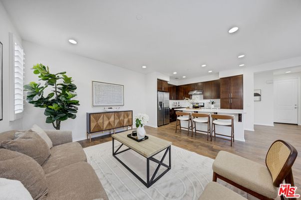 Dining room, Interior, Kitchen, Living room, Recessed Lighting, Stainless Steel Appliances, Wood Texture Flooring