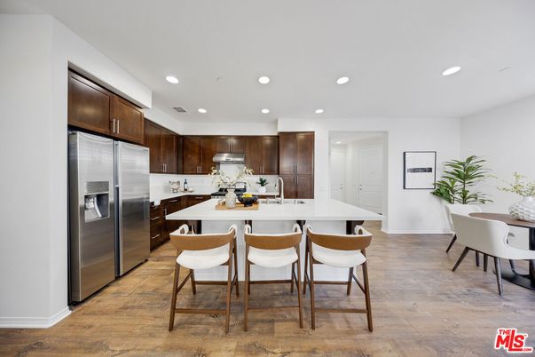Dining room, Interior, Kitchen, Recessed Lighting, Stainless Steel Appliances, Wood Texture Flooring