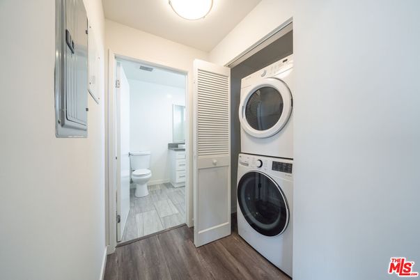 Bathroom, Interior, Utility Closets, Washer, Wood Texture Flooring