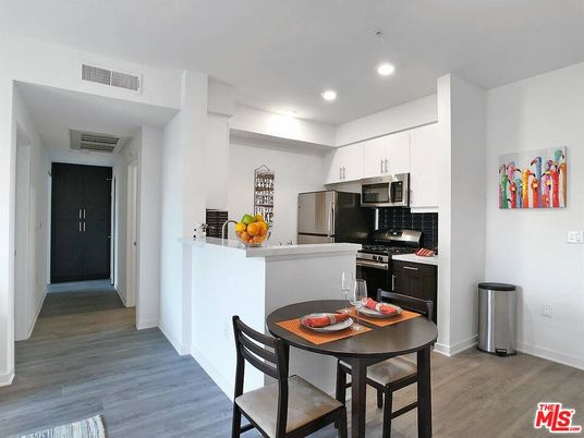 Dining room, Interior, Kitchen, Recessed Lighting, Stainless Steel Appliances, Wood Texture Flooring