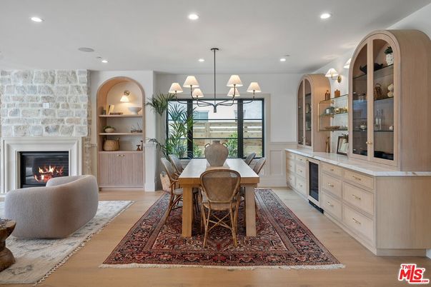 Chandelier, Dining room, Fireplace, Interior, Recessed Lighting, Stone Walls, Wood Texture Flooring