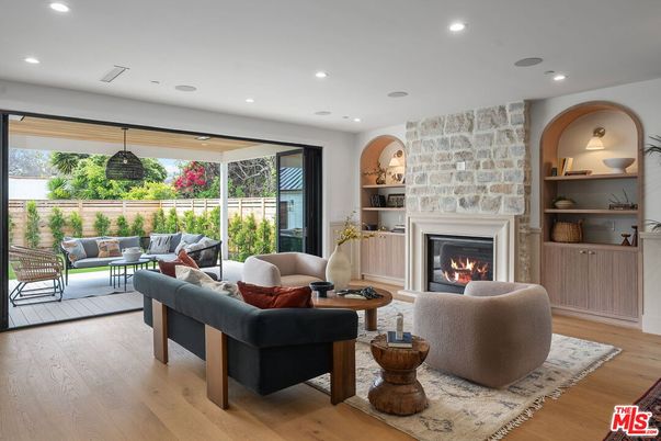 Fireplace, Interior, Living room, Pendant Lights, Recessed Lighting, Stone Walls, Wood Texture Flooring