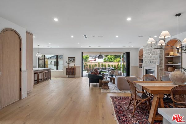 Dining room, Fireplace, Interior, Living room, Pendant Lights, Recessed Lighting, Stone Walls, Wood Texture Flooring