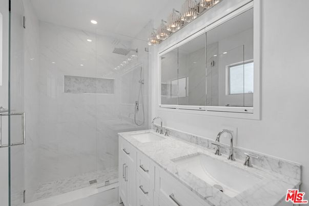 Bathroom, Dual Sink Vanities, Glass Shower, Interior, Marble Walls, Recessed Lighting