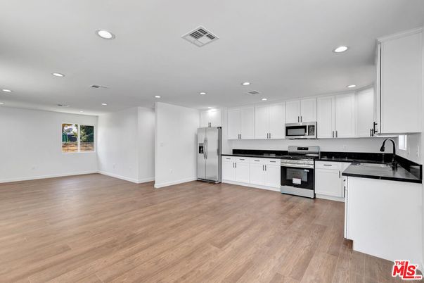 Interior, Kitchen, Recessed Lighting, Stainless Steel Appliances, Wood Texture Flooring