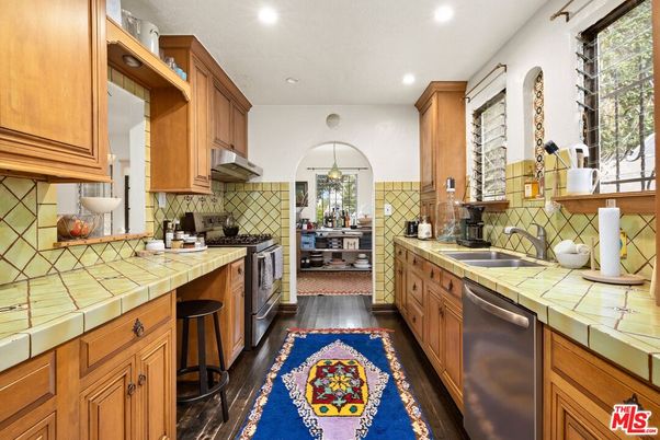 Interior, Kitchen, Pendant Lights, Recessed Lighting, Tile Countertops, Wood Texture Flooring