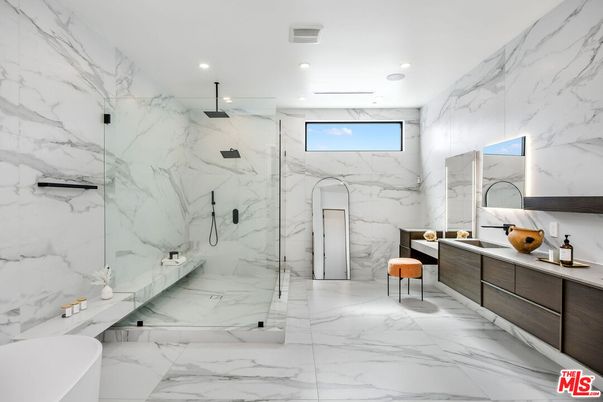 Bathroom, Dual Sink Vanities, Glass Shower, Interior, Marble, Marble Walls, Recessed Lighting