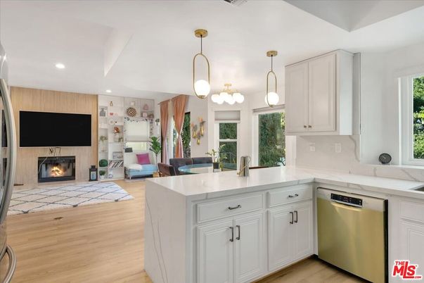 Fireplace, Interior, Kitchen, Pendant Lights, Recessed Lighting, Stainless Steel Appliances, Wood Texture Flooring