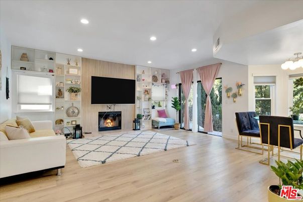Dining room, Fireplace, Interior, Living room, Recessed Lighting, Wood Texture Flooring