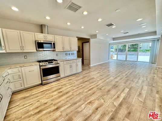 Interior, Kitchen, Recessed Lighting, Stainless Steel Appliances, Wood Texture Flooring