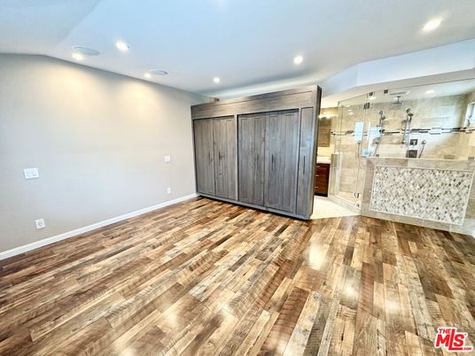 Bathroom, Empty room, Glass Shower, Interior, Recessed Lighting, Wood Texture Flooring