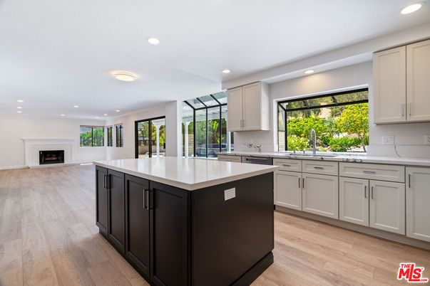 Fireplace, Interior, Kitchen, Recessed Lighting, Wood Texture Flooring