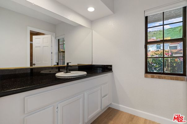 Bathroom, Dual Sink Vanities, Interior, Recessed Lighting, Wood Texture Flooring