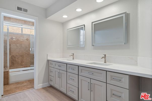 Bathroom, Dual Sink Vanities, Interior, Recessed Lighting, Wood Texture Flooring