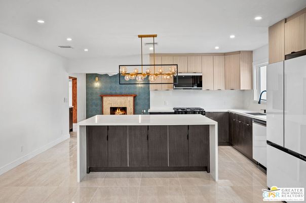 Fireplace, Interior, Kitchen, Pendant Lights, Recessed Lighting, Stainless Steel Appliances