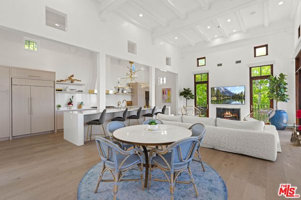 Dining room, Fireplace, Interior, Living room, Pendant Lights, Recessed Lighting, Wood Texture Flooring