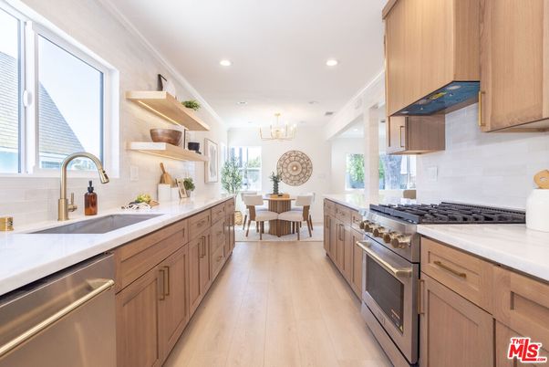 Chandelier, Dining room, Interior, Kitchen, Recessed Lighting, Stainless Steel Appliances, Wood Texture Flooring
