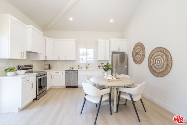 Dining room, Interior, Kitchen, Recessed Lighting, Stainless Steel Appliances, Wood Texture Flooring