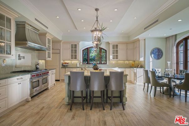 Chandelier, Dining room, Interior, Kitchen, Pendant Lights, Recessed Lighting, Stainless Steel Appliances, Wood Texture Flooring