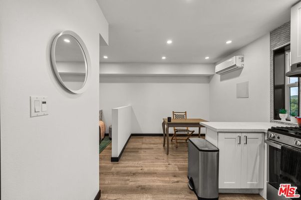 Dining room, Interior, Kitchen, Recessed Lighting, Stainless Steel Appliances, Wood Texture Flooring