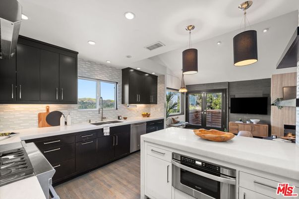 Fireplace, Interior, Kitchen, Pendant Lights, Recessed Lighting, Stainless Steel Appliances, Wood Texture Flooring