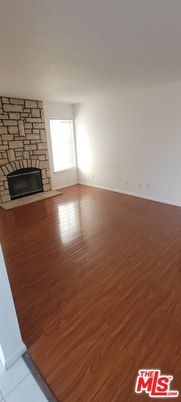 Empty room, Fireplace, Interior, Stone Walls, Wood Texture Flooring