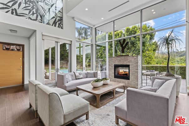 Fireplace, Interior, Living room, Recessed Lighting, Sun Room, Wood Texture Flooring