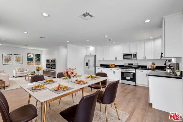 Dining room, Interior, Kitchen, Recessed Lighting, Stainless Steel Appliances, Wood Texture Flooring