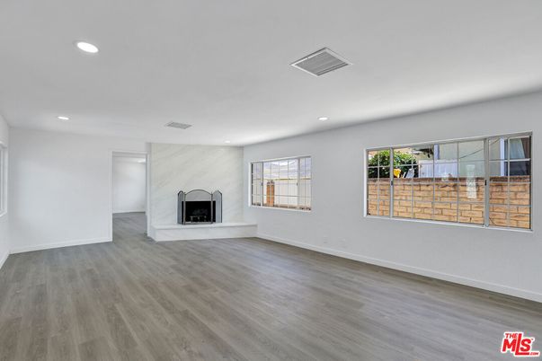 Empty room, Fireplace, Interior, Recessed Lighting, Wood Texture Flooring