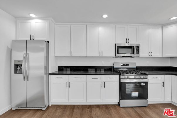 Interior, Kitchen, Recessed Lighting, Stainless Steel Appliances, Wood Texture Flooring