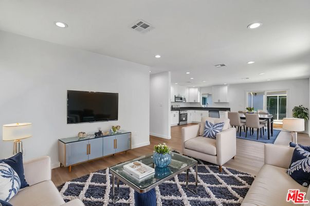 Dining room, Interior, Kitchen, Living room, Recessed Lighting, Stainless Steel Appliances, Wood Texture Flooring