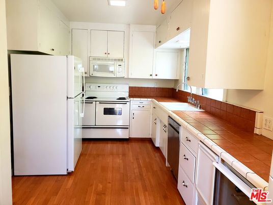Interior, Kitchen, Tile Countertops, Wood Texture Flooring