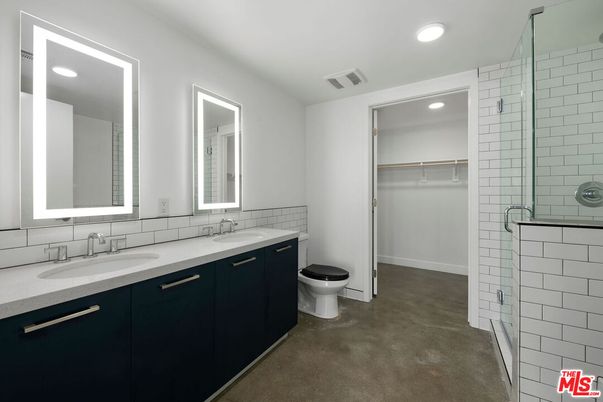 Bathroom, Dual Sink Vanities, Glass Shower, Interior, Recessed Lighting, Walk-in Closets
