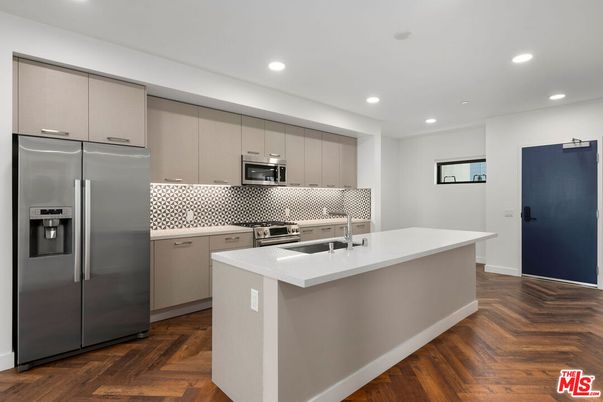 Interior, Kitchen, Recessed Lighting, Stainless Steel Appliances, Wood Texture Flooring