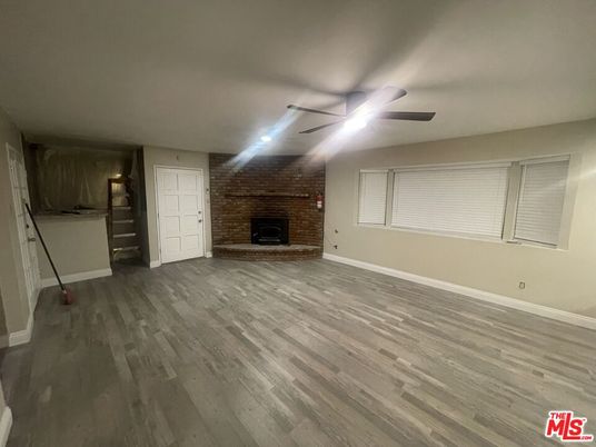 Empty room, Fireplace, Interior, Stone Walls, Wood Texture Flooring
