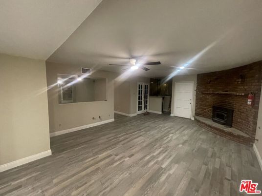 Empty room, Fireplace, Interior, Stone Walls, Wood Texture Flooring