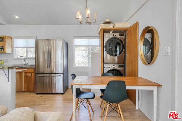 Chandelier, Dining room, Interior, Kitchen, Recessed Lighting, Washer, Wood Texture Flooring