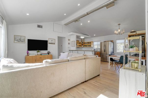 Chandelier, Dining room, Interior, Kitchen, Living room, Recessed Lighting, Stainless Steel Appliances, Wood Texture Flooring