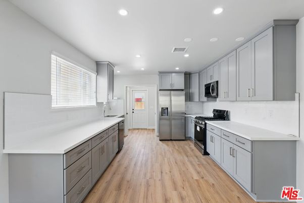 Interior, Kitchen, Recessed Lighting, Stainless Steel Appliances, Wood Texture Flooring