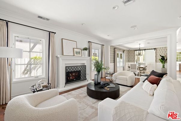 Dining room, Fireplace, Interior, Living room, Pendant Lights, Recessed Lighting, Wood Texture Flooring