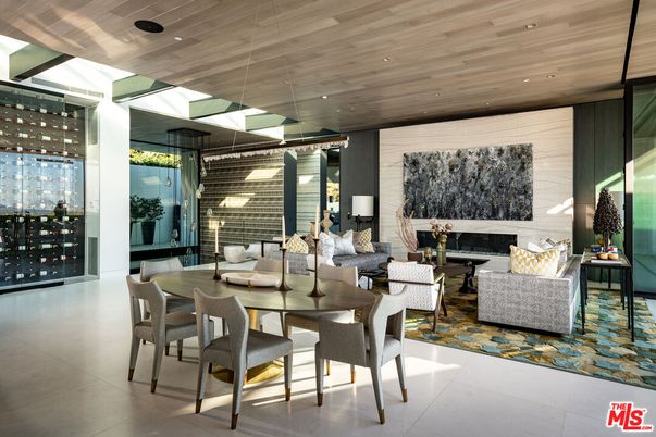Dining room, Fireplace, Interior, Living room, Pendant Lights, Recessed Lighting, Stone Walls, Wine Storage, Wooden Ceilings