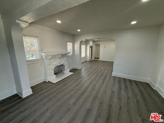 Empty room, Fireplace, Interior, Recessed Lighting, Wood Texture Flooring
