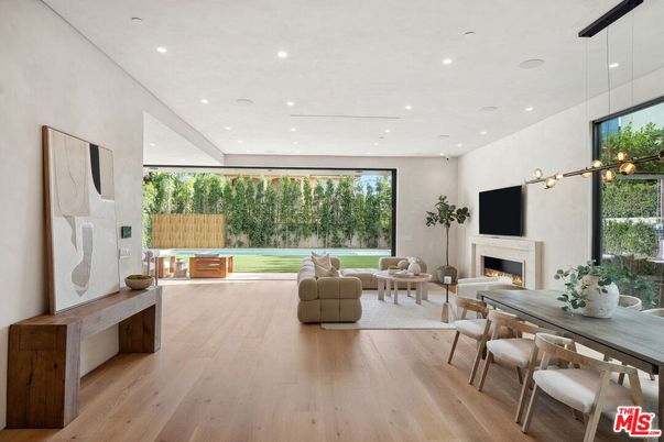 Dining room, Fireplace, Interior, Living room, Pendant Lights, Recessed Lighting, Wood Texture Flooring