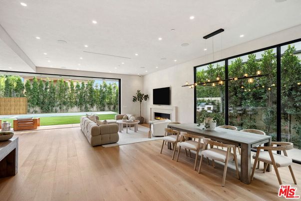Dining room, Fireplace, Interior, Living room, Pendant Lights, Recessed Lighting, Wood Texture Flooring