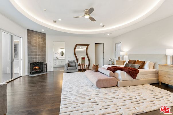 Bedroom, Fireplace, Interior, Living room, Recessed Lighting, Wood Texture Flooring