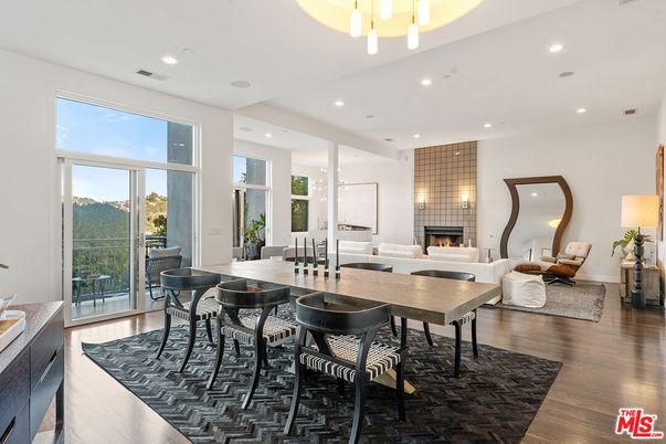 Dining room, Fireplace, Interior, Living room, Pendant Lights, Recessed Lighting, Wood Texture Flooring