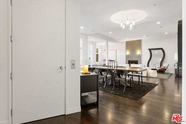 Dining room, Fireplace, Interior, Living room, Pendant Lights, Recessed Lighting, Wood Texture Flooring